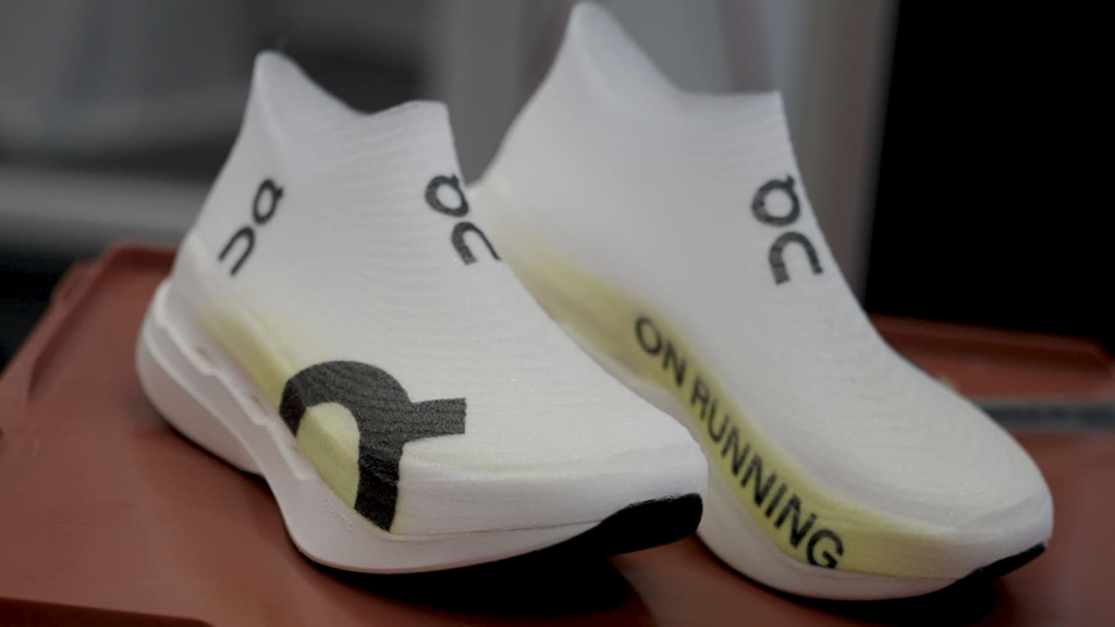 Shares of Swiss tennis shoe business On dive as it posts 32% sales development, walkings outlook