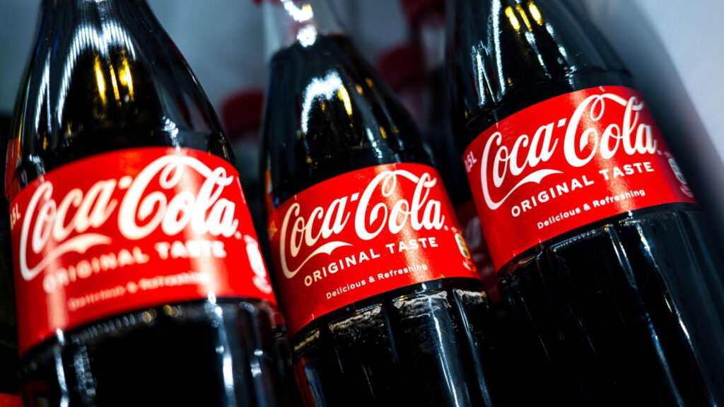 Coca-Cola tops incomes and income estimates however states demand for drinks is still soft